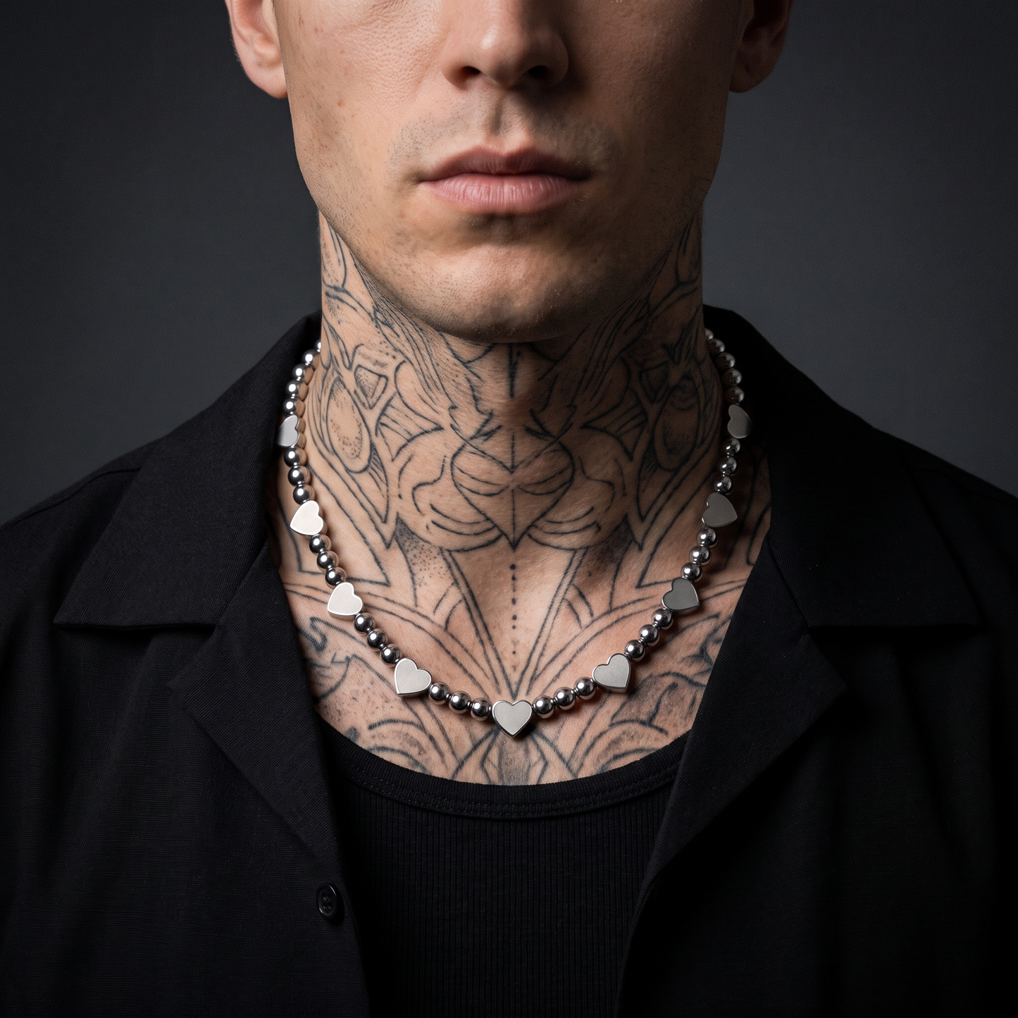 Chrome Hearts worn on model — tattooed male