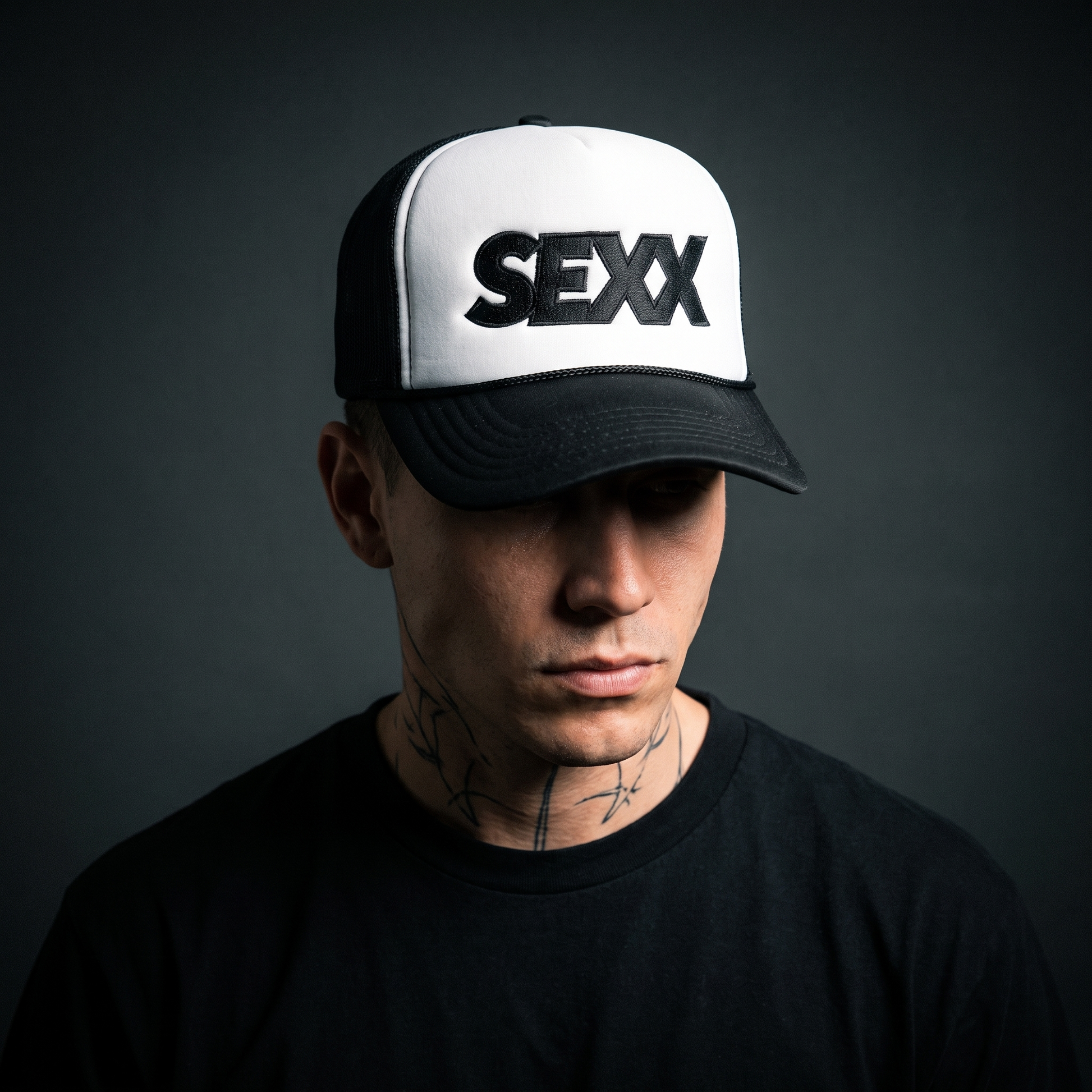 SEXX Trucker Hat worn on model — tattooed male